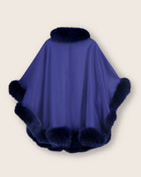 Back of Fur Trimmed cashmere Cape in Cobalt