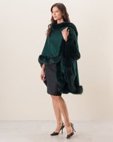 Woman Wearing Fur Trimmed cashmere Cape in Emerald