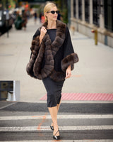 Model walking while wearing Imperial Sable Cashmere Cape  in black
