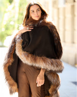 Woman wearing brown multi silver fur trimmed cervinia on a street
