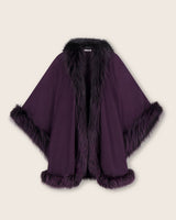 Currant multi cape with fur trim on a beige background