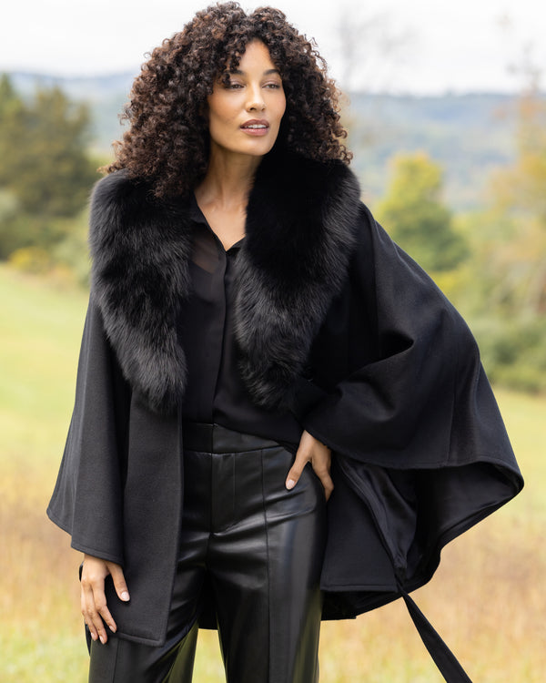 Model wearing Duchess Cashmere Wool Blend Cape Coat in black 
