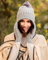 woman wearing Pomerano Cashmere PomPom Beanie in Grey