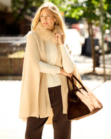 model wearing Arden Cashmere Cape in oat 