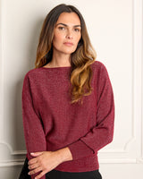 up close of a model wearing Stella Lurex Boat Neck Sweater in bordeaux