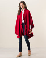 Woman wearing Knitted Cashmere Cape in Red with jeans and flats