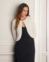 Model wearing slip dress and Valentina Sequin Bolero Cardigan in white