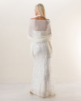 Woman wearing Lightweight Cashmere Wrap in  Ecru