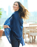model wearing St Tropez wrap in dark navy, side view