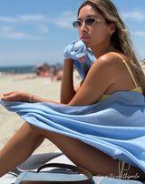 Paola wearing Lightweight Cashmere Wrap in Sky Blue