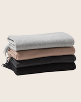stack of three pure Mongolian cashmere Fringed Woven cashmere Throws in grey