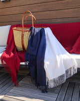Trentino throws in a tote, ivory