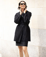Woman wearing Victoria cashmere belted coat in black 