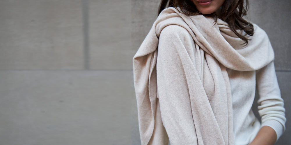 Photo of a woman wearing a cashmere travel wrap