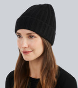 woman wearing Chunky Tuck Stitched Cuffed Hat in Black