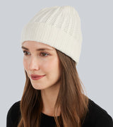 woman wearing Chunky Tuck Stitched Cuffed Hat in Ivory