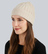 woman wearing Chunky Tuck Stitched Cuffed Hat in Oatmeal