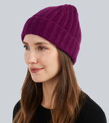 woman wearing Chunky Tuck Stitched Cuffed Hat in Mulberry